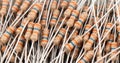 Electronic resistors texture background. Carbon film resistors background. Macro shot various electronic components