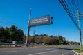 Electronic sign over highway that says, Active Shooter Take Cover Now