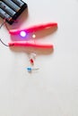 Electronic soft circuits with LEDs, batteries and modeling clay.