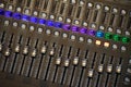 Sound mixer board with illuminated buttons Royalty Free Stock Photo