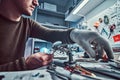 Electronic technician working in the repair shop