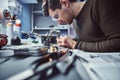 Electronic technician working in the repair shop