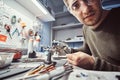 Electronic technician working in the repair shop Royalty Free Stock Photo