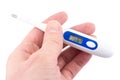 Electronic thermometer in human hand isolated on white background, body temperature measurement tool