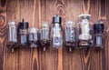 Electronic vacuum tubes on the wooden background. closeup view.