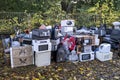 Electronic waste Awaiting recycling. A pile of garbage in nature. Green strategy recycling