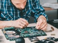 Electronics repair shop disassembled laptop