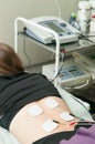 Electrotherapy for a girl in the physiotherapy room Royalty Free Stock Photo