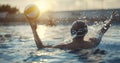 Elegance in Action - Water polo player reaching the ball in swimming pool Royalty Free Stock Photo