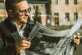 Elegance beauty man in glasses read newspaper