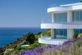 Elegance in contemporary luxury close up of white villa against clear blue skies