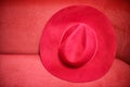 Elegance lady red hat on the red background Royalty Free Stock Photo
