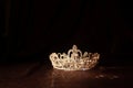 Elegance luxury royal crown on satin, silk background. Queen