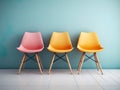 Elegance meets simplicity in this minimalist studio shoot of a beautifully designed room with three colorful chairs.