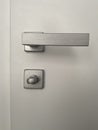 Grey Door Handle Lock And Little Key Royalty Free Stock Photo