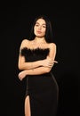 Elegance in simplicity. Black is perfect. Glamorous style. Feather decorations. Elegant woman fashion model. Fashionable