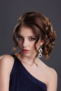 Elegance. Stylish Lady with Precious Gem - Platinum Eardrops with Jewels Royalty Free Stock Photo