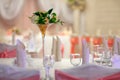 Elegance table set up for wedding. Flowers in the vase. Royalty Free Stock Photo