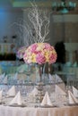 Elegance table set up for wedding. Flowers in the vase. Royalty Free Stock Photo