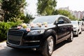 Elegance wedding limousine car with floral decoration Royalty Free Stock Photo