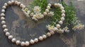 An elegance white pearl and daimond necklace on grey stone Royalty Free Stock Photo