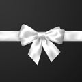 Elegance white satin bow with ribbon. Vector illustration isolated on dark background Royalty Free Stock Photo