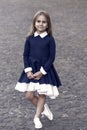 Elegance that you deserve. Little child wear uniform dress outdoors. Back to school fashion. Fashion look of small girl