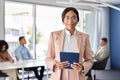 Elegant African American business woman leader standing at office meeting. Royalty Free Stock Photo