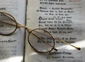 Elegant and antique glasses on a book