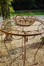 Elegant antique patterned iron garden furniture set, high table Royalty Free Stock Photo