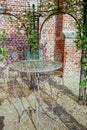 Elegant antique patterned iron garden furniture set, high table Royalty Free Stock Photo