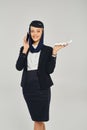 elegant arabian airlines stewardess with airplane Royalty Free Stock Photo