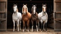 Elegant Arabian Horses in a Well-Lit Stable Royalty Free Stock Photo