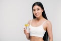 elegant asian girl in bra holding glass of water Royalty Free Stock Photo