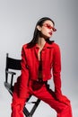 elegant asian model in red jacket Royalty Free Stock Photo