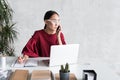 Elegant attractive asian girl is talking on smartphone Royalty Free Stock Photo