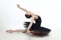 Elegant ballerina made a deflection. photo shoots in the studio on a white background