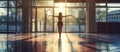 An elegant ballet dancer performs gracefully in a sunlit studio, showing artistry and athleticism AIG62 Royalty Free Stock Photo