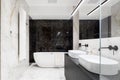 Elegant bathroom in marble tiles