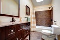 Elegant bathroom with tile wall trim
