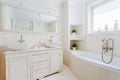 Elegant bathroom with white fittings