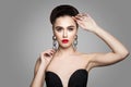 Elegant Beautiful Woman with Hair Updo and Perfect Make up