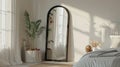 an elegant bedroom adorned with a large black arch mirror, accompanied by a small white wicker basket filled with items