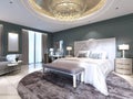 Elegant bedroom interior with large comfortable bed and sofa with dressing table