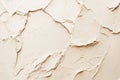 Elegant beige matte surface with fine texture and soft shadows, showcasing a slightly uneven powdery finish for