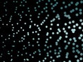 Elegant black background with shining, glowing circles, dots. Neon, led abstract pattern of lights and bokeh Royalty Free Stock Photo