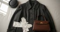 Elegant Black Coat with Accessories and Handbag Royalty Free Stock Photo