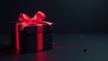 Elegant black gift box with glowing red neon ribbon, dark backdrop , red, bright Royalty Free Stock Photo
