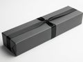 Elegant black gift box wrapped with a black ribbon on a white background Royalty Free Stock Photo