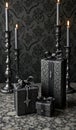 Elegant black gift boxes with gothic candlelit decor on marble surface Royalty Free Stock Photo